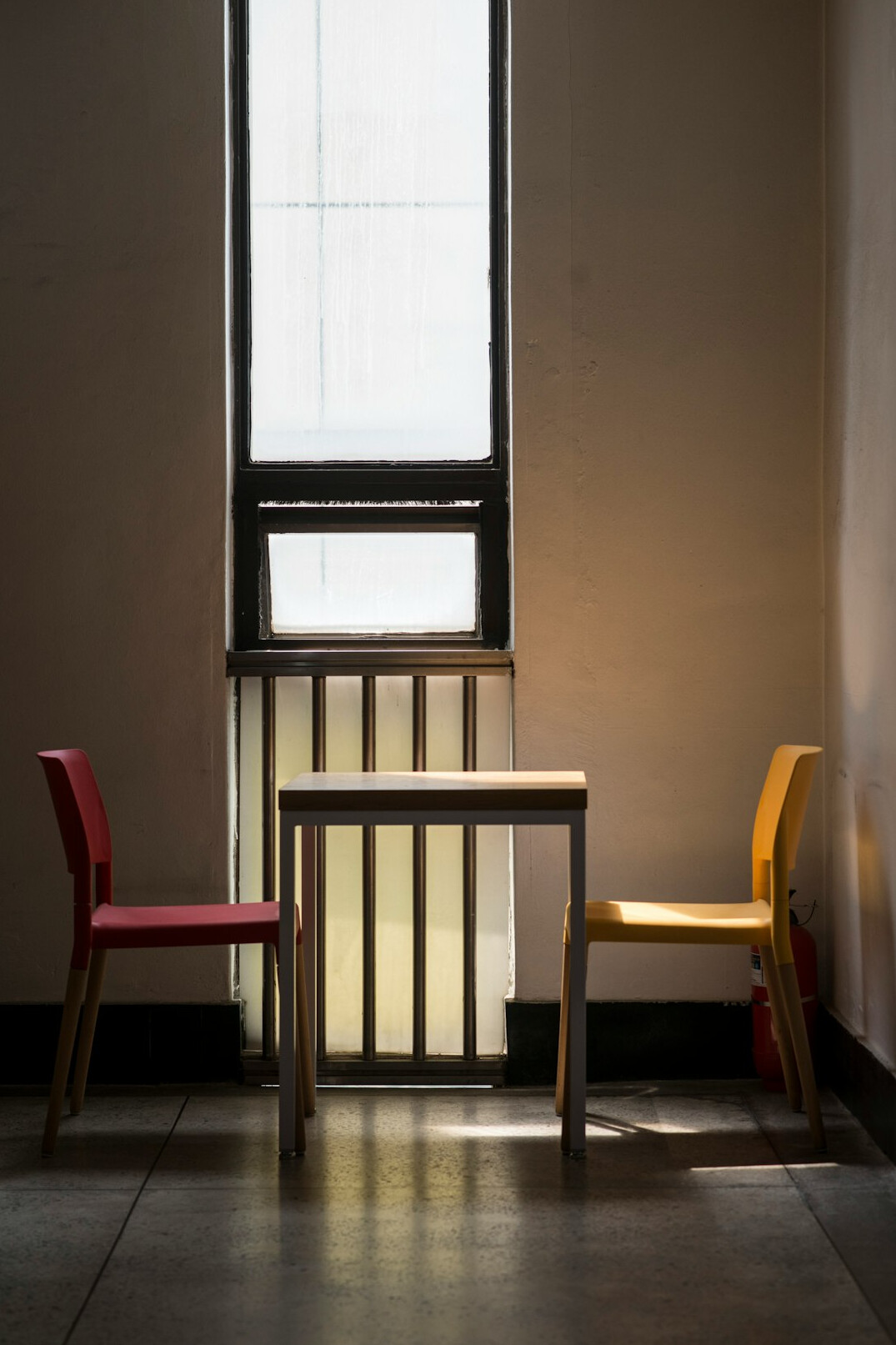 Two chairs on an interview set with soft lighting
