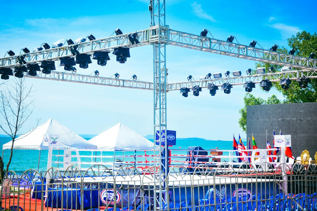 Large live entertainment stage with lighting rig and cameras